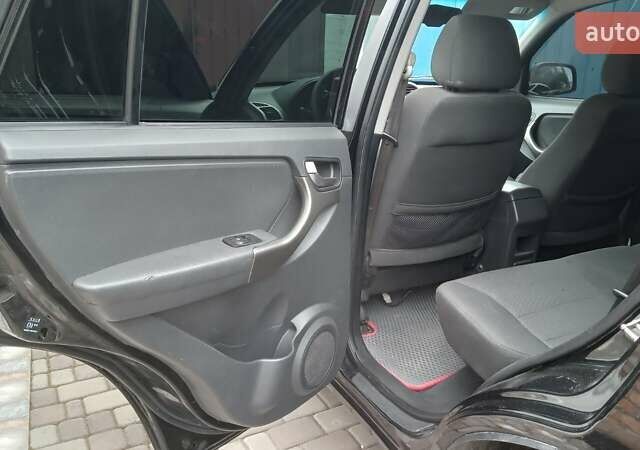 Чорний Чері Тігго, об'ємом двигуна 1.8 л та пробігом 180 тис. км за 5900 $, фото 7 на Automoto.ua