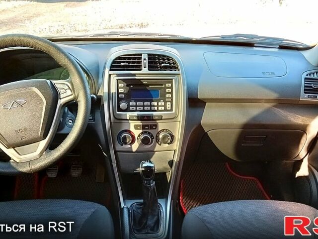 Черный Чери Тигго, объемом двигателя 1.8 л и пробегом 178 тыс. км за 5600 $, фото 9 на Automoto.ua