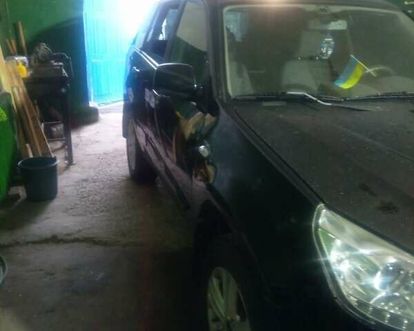 Чорний Чері Тігго, об'ємом двигуна 1.85 л та пробігом 160 тис. км за 5000 $, фото 12 на Automoto.ua