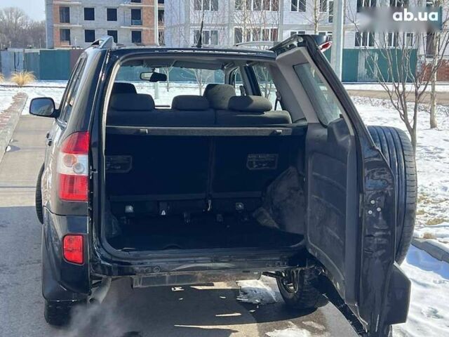 Черный Чери Тигго, объемом двигателя 1.8 л и пробегом 104 тыс. км за 5700 $, фото 10 на Automoto.ua