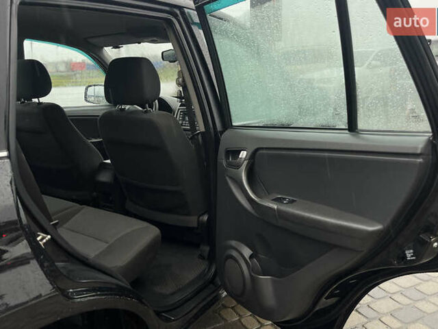 Черный Чери Тигго, объемом двигателя 1.85 л и пробегом 206 тыс. км за 6100 $, фото 21 на Automoto.ua