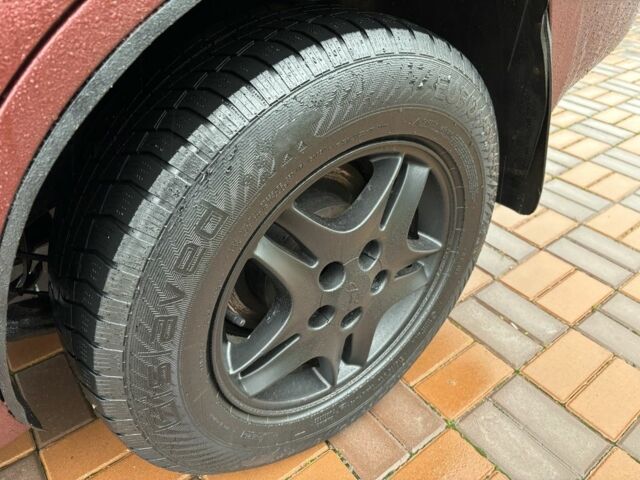 Красный Чери Тигго, объемом двигателя 2 л и пробегом 187 тыс. км за 2499 $, фото 8 на Automoto.ua