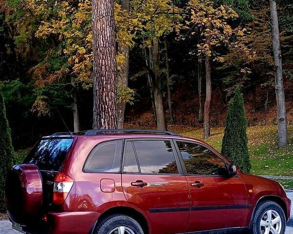 Червоний Чері Тігго, об'ємом двигуна 2 л та пробігом 210 тис. км за 4300 $, фото 5 на Automoto.ua