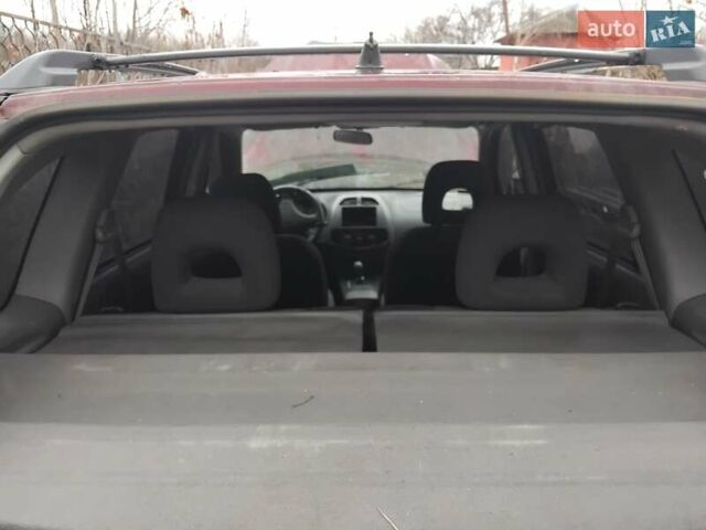 Червоний Чері Тігго, об'ємом двигуна 2 л та пробігом 156 тис. км за 2000 $, фото 4 на Automoto.ua