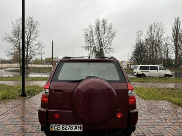 Красный Чери Тигго, объемом двигателя 2 л и пробегом 187 тыс. км за 2499 $, фото 4 на Automoto.ua