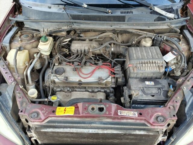 Червоний Чері Тігго, об'ємом двигуна 2 л та пробігом 200 тис. км за 2500 $, фото 6 на Automoto.ua