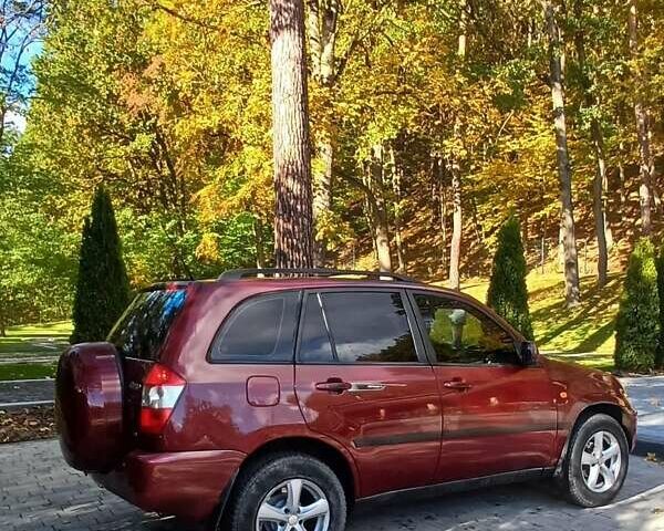 Червоний Чері Тігго, об'ємом двигуна 2 л та пробігом 210 тис. км за 4300 $, фото 1 на Automoto.ua