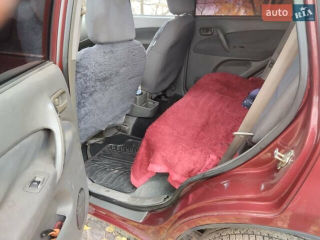 Чері Тігго 2007 у Дніпро (Дніпропетровську) на Automoto.ua Червоний Чері Тігго, об'ємом двигуна 2 л та пробігом 244 тис. км за 3700 $, фото 1 на Automoto.ua