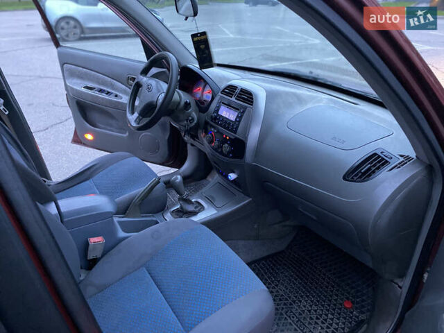 Красный Чери Тигго, объемом двигателя 2 л и пробегом 181 тыс. км за 3250 $, фото 10 на Automoto.ua