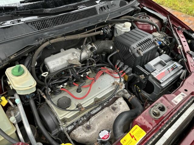 Красный Чери Тигго, объемом двигателя 2 л и пробегом 187 тыс. км за 2499 $, фото 9 на Automoto.ua