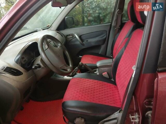 Червоний Чері Тігго, об'ємом двигуна 2 л та пробігом 132 тис. км за 3700 $, фото 6 на Automoto.ua