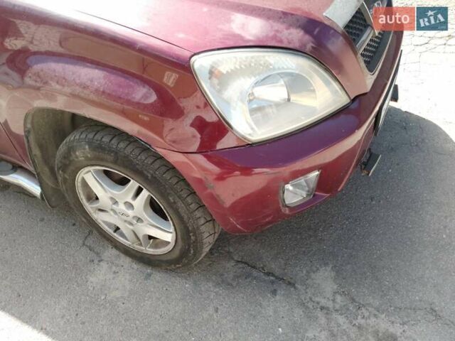 Красный Чери Тигго, объемом двигателя 2.35 л и пробегом 106 тыс. км за 3600 $, фото 2 на Automoto.ua