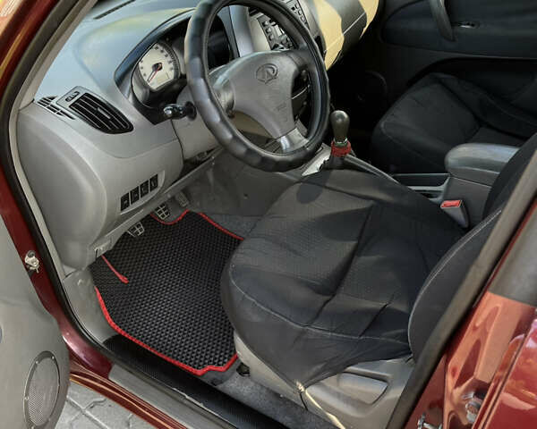 Красный Чери Тигго, объемом двигателя 2 л и пробегом 100 тыс. км за 4499 $, фото 8 на Automoto.ua