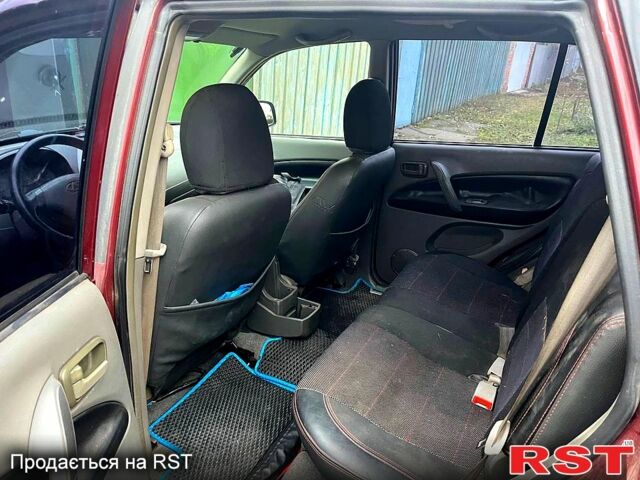 Червоний Чері Тігго, об'ємом двигуна 2 л та пробігом 200 тис. км за 3800 $, фото 8 на Automoto.ua