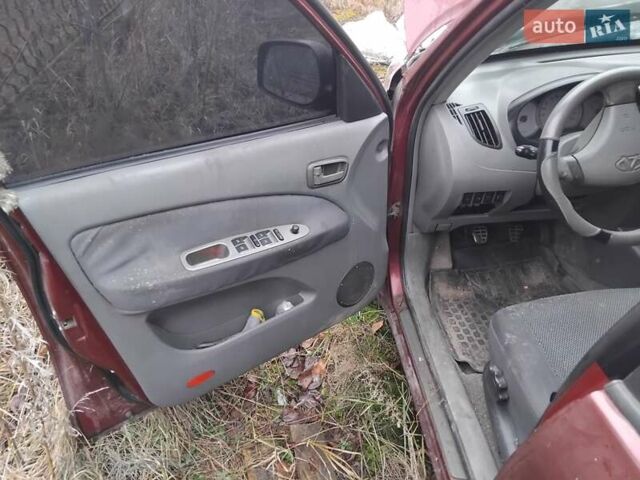 Червоний Чері Тігго, об'ємом двигуна 2 л та пробігом 156 тис. км за 2000 $, фото 8 на Automoto.ua