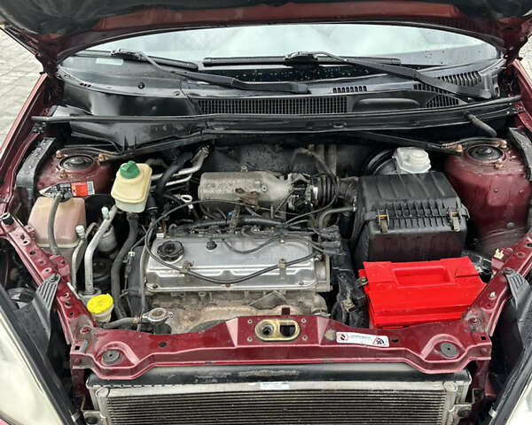 Червоний Чері Тігго, об'ємом двигуна 2 л та пробігом 160 тис. км за 3500 $, фото 9 на Automoto.ua