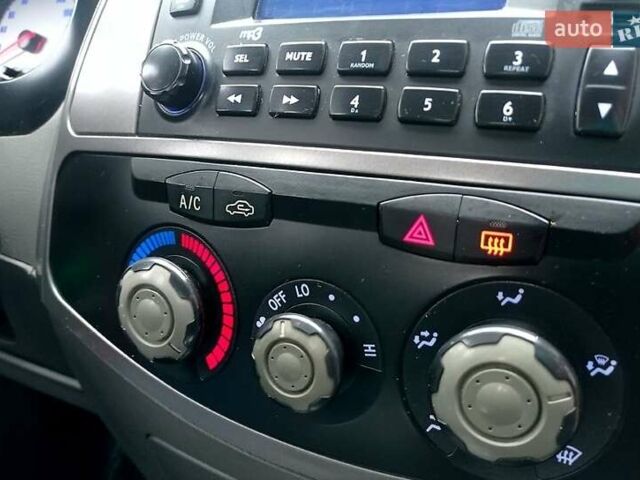 Красный Чери Тигго, объемом двигателя 2.4 л и пробегом 154 тыс. км за 4800 $, фото 1 на Automoto.ua