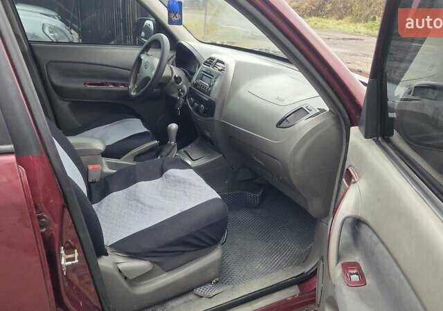 Червоний Чері Тігго, об'ємом двигуна 2.35 л та пробігом 170 тис. км за 3200 $, фото 12 на Automoto.ua