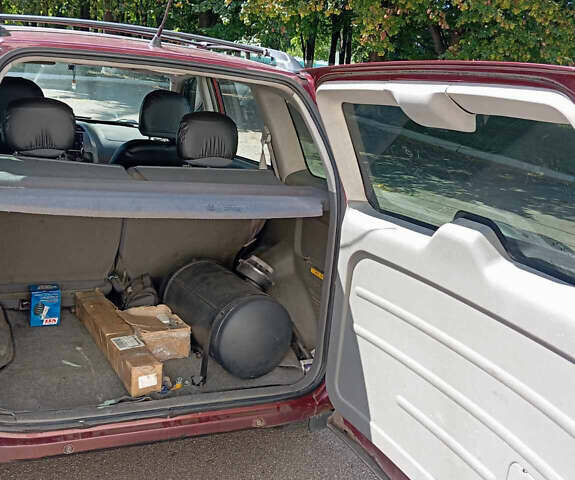 Красный Чери Тигго, объемом двигателя 2 л и пробегом 203 тыс. км за 3200 $, фото 3 на Automoto.ua