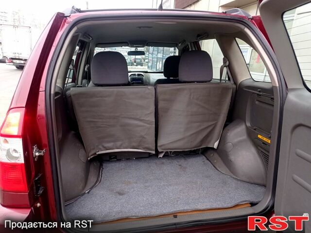 Красный Чери Тигго, объемом двигателя 2.4 л и пробегом 154 тыс. км за 4800 $, фото 1 на Automoto.ua