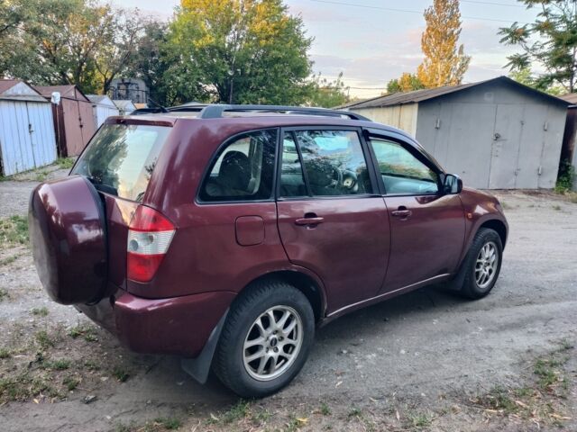 Красный Чери Тигго, объемом двигателя 2.4 л и пробегом 149 тыс. км за 4200 $, фото 11 на Automoto.ua