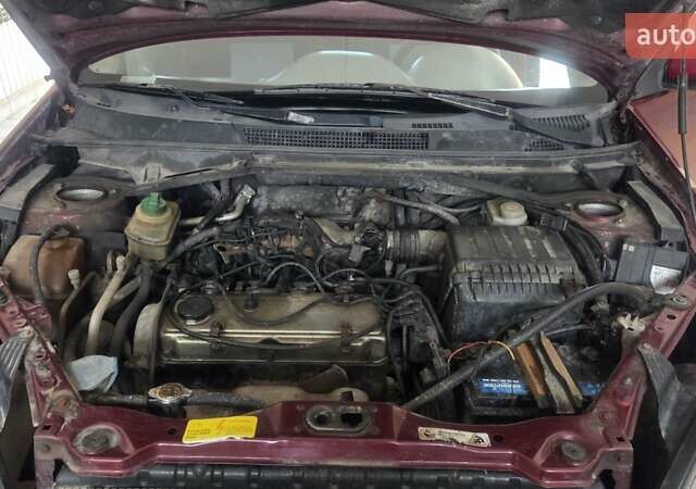 Червоний Чері Тігго, об'ємом двигуна 2.35 л та пробігом 170 тис. км за 3200 $, фото 16 на Automoto.ua