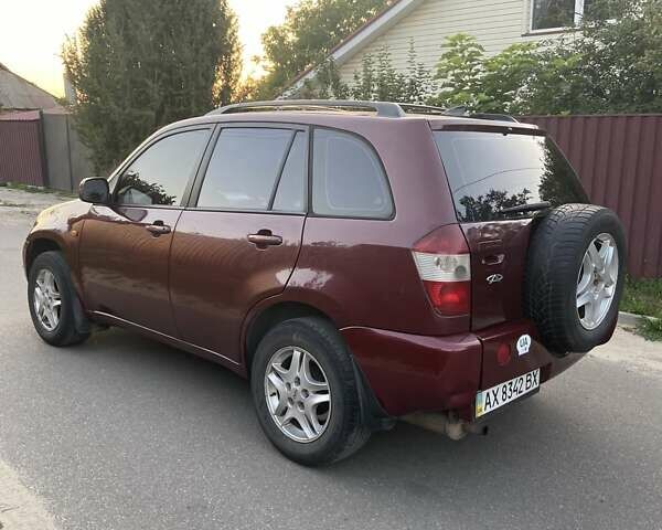 Червоний Чері Тігго, об'ємом двигуна 2 л та пробігом 200 тис. км за 3300 $, фото 3 на Automoto.ua