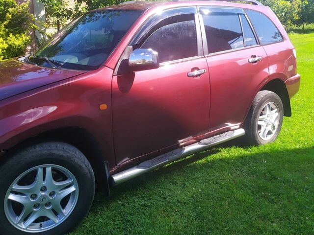 Красный Чери Тигго, объемом двигателя 2 л и пробегом 265 тыс. км за 4100 $, фото 5 на Automoto.ua