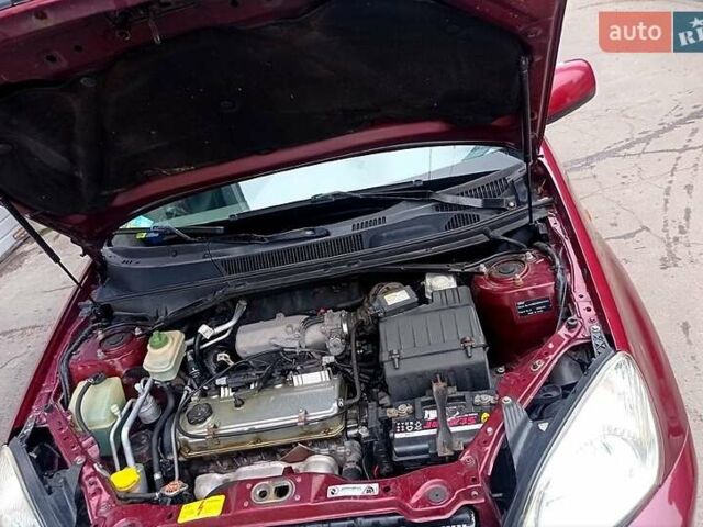 Красный Чери Тигго, объемом двигателя 2.4 л и пробегом 154 тыс. км за 4800 $, фото 10 на Automoto.ua