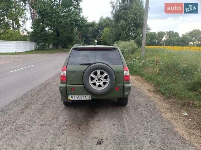 Красный Чери Тигго, объемом двигателя 1.85 л и пробегом 180 тыс. км за 2000 $, фото 6 на Automoto.ua
