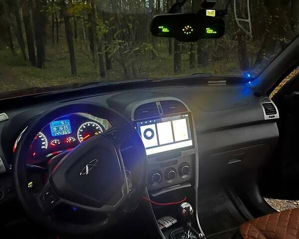 Красный Чери Тигго, объемом двигателя 1.85 л и пробегом 144 тыс. км за 5800 $, фото 2 на Automoto.ua