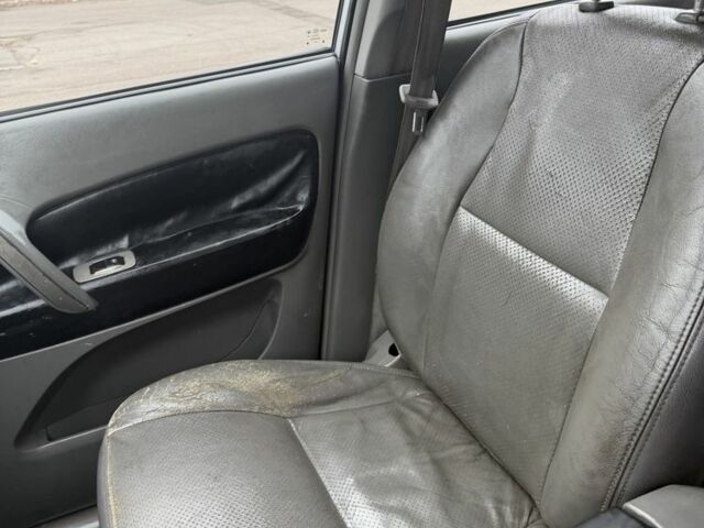 Серый Чери Тигго, объемом двигателя 2.4 л и пробегом 129 тыс. км за 2150 $, фото 7 на Automoto.ua