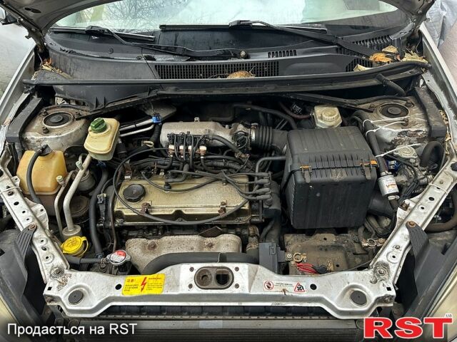 Сірий Чері Тігго, об'ємом двигуна 2 л та пробігом 210 тис. км за 3300 $, фото 2 на Automoto.ua