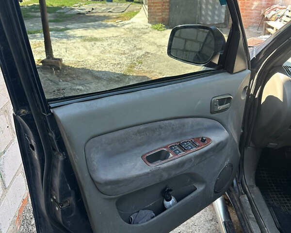 Синій Чері Тігго, об'ємом двигуна 2 л та пробігом 212 тис. км за 3300 $, фото 5 на Automoto.ua