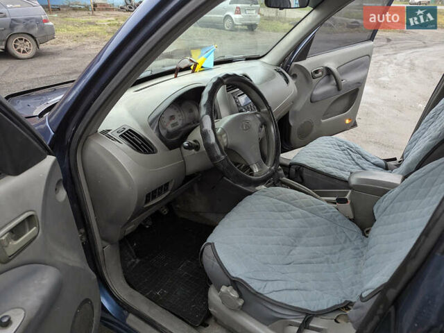 Синій Чері Тігго, об'ємом двигуна 2 л та пробігом 252 тис. км за 2600 $, фото 3 на Automoto.ua