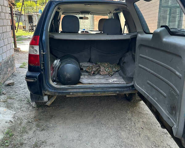 Синій Чері Тігго, об'ємом двигуна 2 л та пробігом 212 тис. км за 3300 $, фото 3 на Automoto.ua