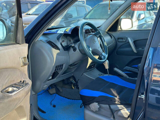 Синій Чері Тігго, об'ємом двигуна 2.4 л та пробігом 280 тис. км за 3400 $, фото 4 на Automoto.ua