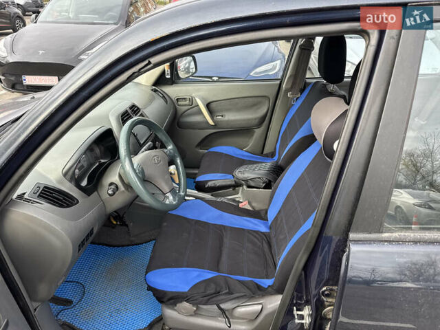 Синий Чери Тигго, объемом двигателя 2.4 л и пробегом 280 тыс. км за 3400 $, фото 6 на Automoto.ua