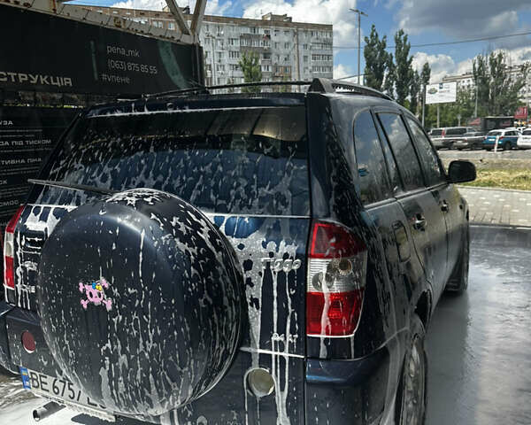 Синий Чери Тигго, объемом двигателя 2.35 л и пробегом 293 тыс. км за 4100 $, фото 2 на Automoto.ua