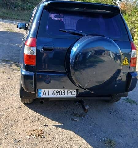 Синій Чері Тігго, об'ємом двигуна 2 л та пробігом 261 тис. км за 4800 $, фото 3 на Automoto.ua