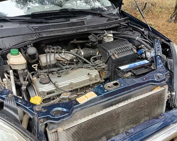 Синій Чері Тігго, об'ємом двигуна 2 л та пробігом 101 тис. км за 2950 $, фото 10 на Automoto.ua