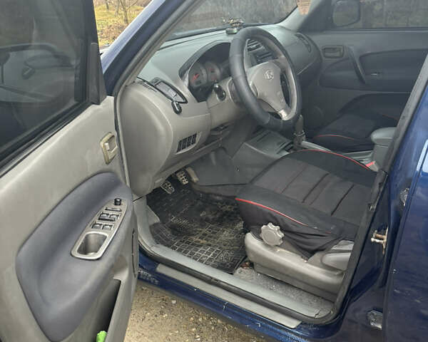 Синий Чери Тигго, объемом двигателя 2 л и пробегом 310 тыс. км за 3299 $, фото 7 на Automoto.ua