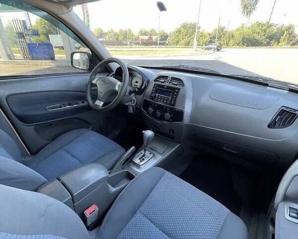 Синий Чери Тигго, объемом двигателя 2.4 л и пробегом 230 тыс. км за 3500 $, фото 6 на Automoto.ua