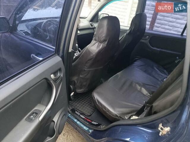 Синий Чери Тигго, объемом двигателя 1.85 л и пробегом 155 тыс. км за 4000 $, фото 6 на Automoto.ua