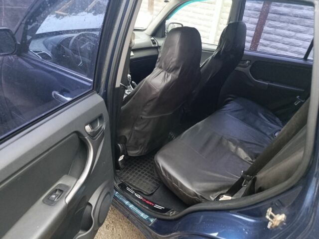 Синий Чери Тигго, объемом двигателя 1.8 л и пробегом 150 тыс. км за 4000 $, фото 5 на Automoto.ua