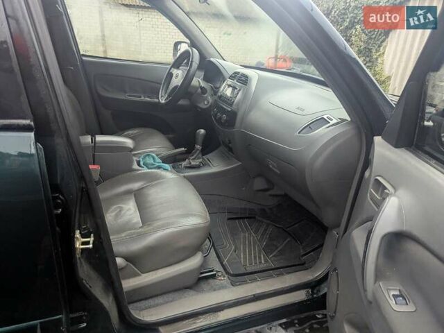 Зелений Чері Тігго, об'ємом двигуна 2.35 л та пробігом 230 тис. км за 3900 $, фото 10 на Automoto.ua