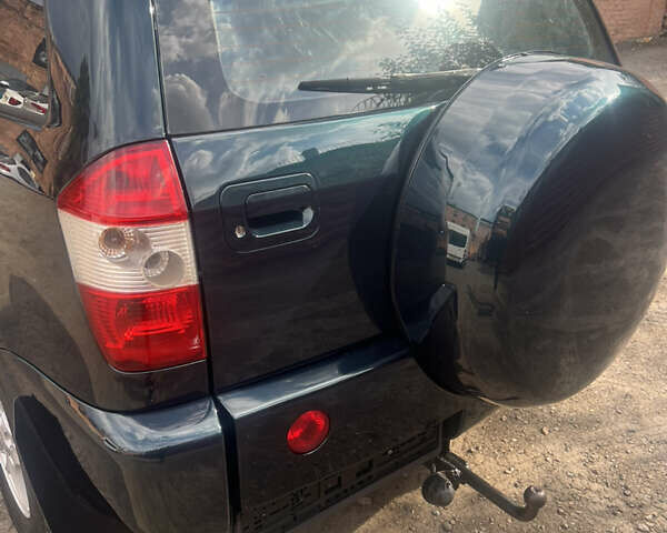 Зелений Чері Тігго, об'ємом двигуна 2 л та пробігом 189 тис. км за 4800 $, фото 4 на Automoto.ua