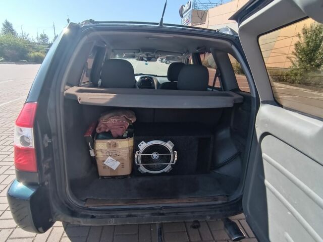 Зеленый Чери Тигго, объемом двигателя 2.4 л и пробегом 235 тыс. км за 3200 $, фото 4 на Automoto.ua