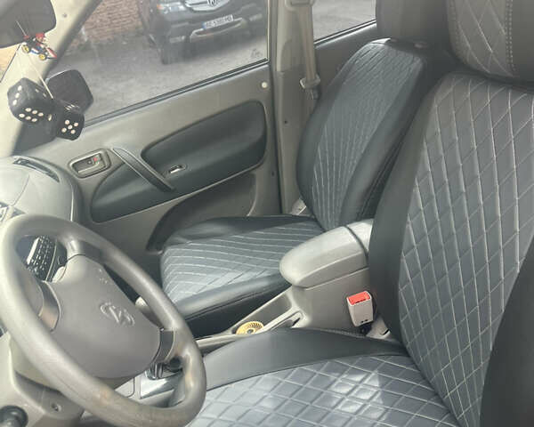 Зелений Чері Тігго, об'ємом двигуна 2 л та пробігом 189 тис. км за 4800 $, фото 6 на Automoto.ua