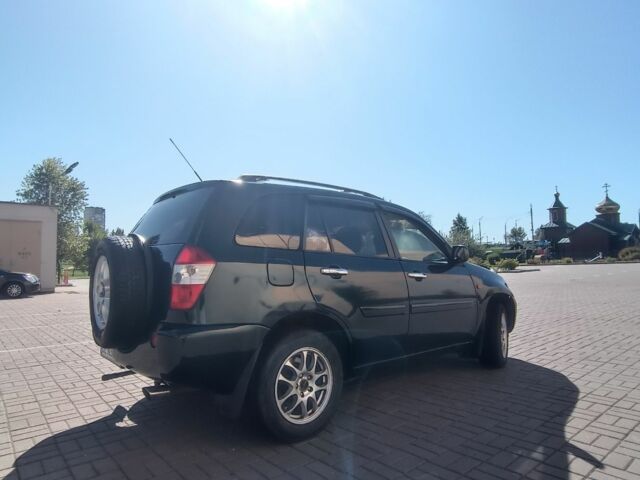 Зеленый Чери Тигго, объемом двигателя 2.4 л и пробегом 235 тыс. км за 3200 $, фото 9 на Automoto.ua